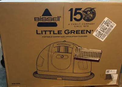 Bissell little green portable carpet cleaner comes on